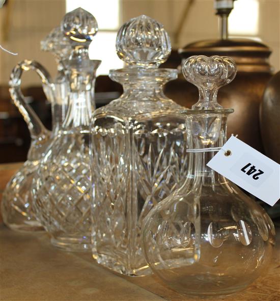 Four glass decanters